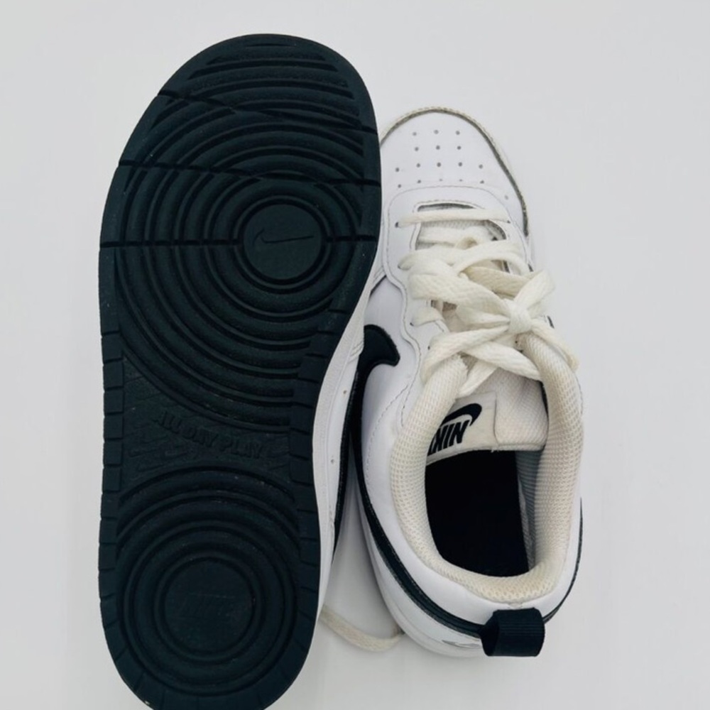 Nike Kids White Sneakers with Black Swoosh